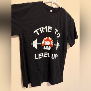 Black Graphic Tee with Retro Gaming Design